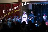 The Lemoore High School Choral Program put on an entertaining show Friday night in the school's cafeteria. Sammi Stroup and John Glaspie singing June Carter and Johnny Cash.